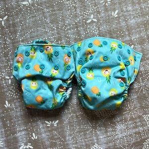 2 Newborn all in one (AIO) cloth diapers - pineapples, blue